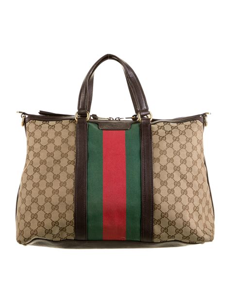 gucci signature web shoulder bag.